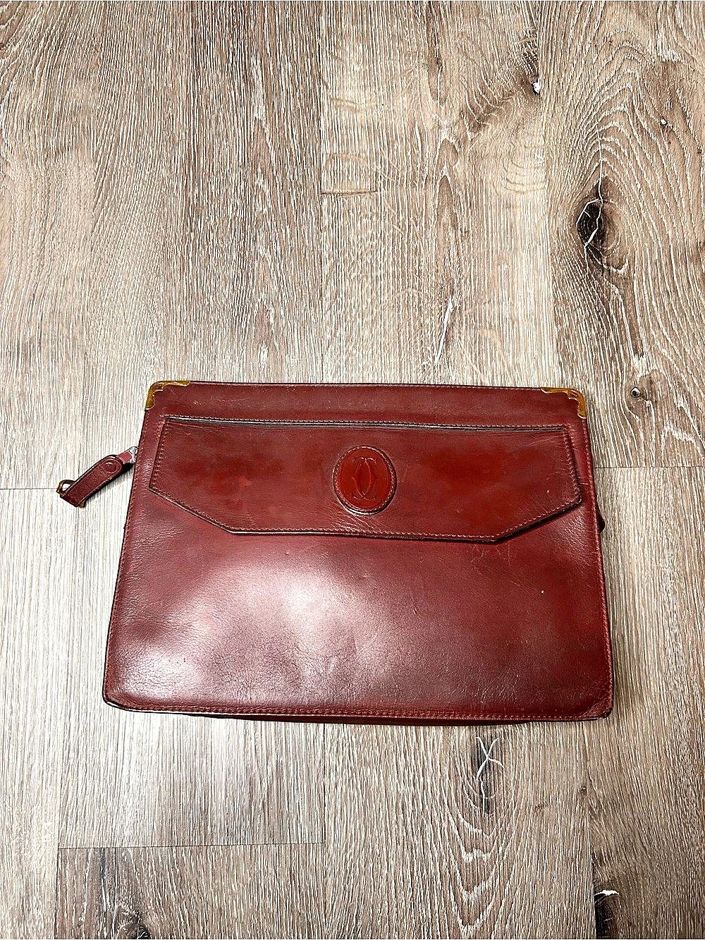 Cartier Leather Wristlet Clutch in Burgundy